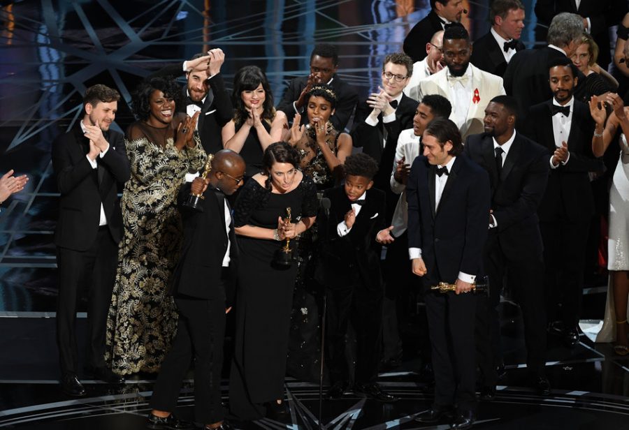 HOLLYWOOD, CA - FEBRUARY 26: Cast and crew of Moonlight accept the Best Picture award onstage during the 89th Annual Academy Awards at Hollywood & Highland Center on February 26, 2017 in Hollywood, California.  (Photo by Kevin Winter/Getty Images)