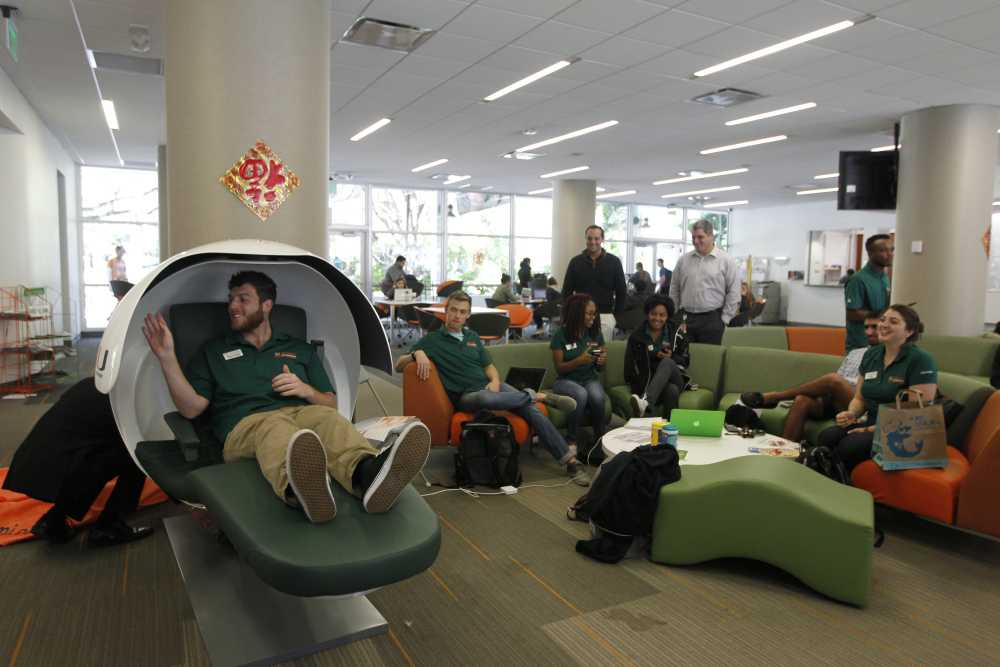 Students try out napping pods at the University of Miami. Courtesy of the University of Miami.